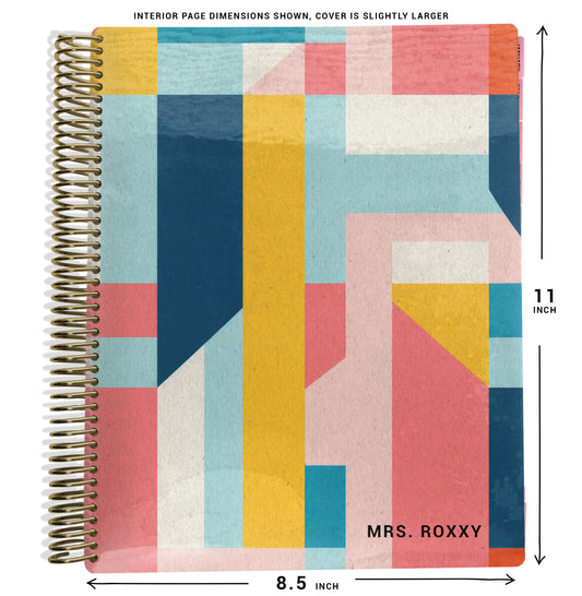 yellow, blue, pink color blocking pattern on planner Notebook with spiral binding and size dimensions labeled on a white background