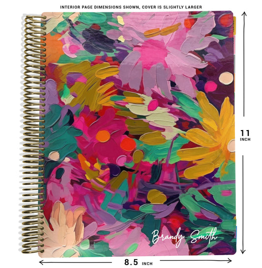 colorful pink, yellow, and purple flowers pattern on planner Notebook with spiral binding and size dimensions labeled on a white background
