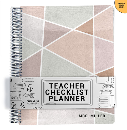 pink green and tan geometric pattern on planner Notebook with spiral binding on a white background