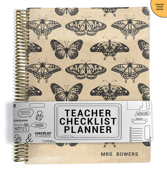 beige and black moths and butterflies pattern on planner Notebook with spiral binding on a white background