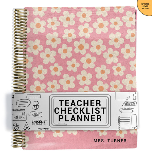pink with flowers planner Notebook with spiral binding on a white background