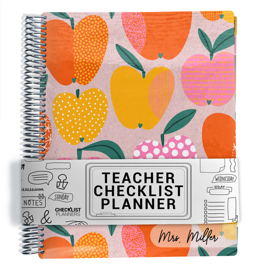 orange and pink geometric apples pattern on planner Notebook with spiral binding on a white background