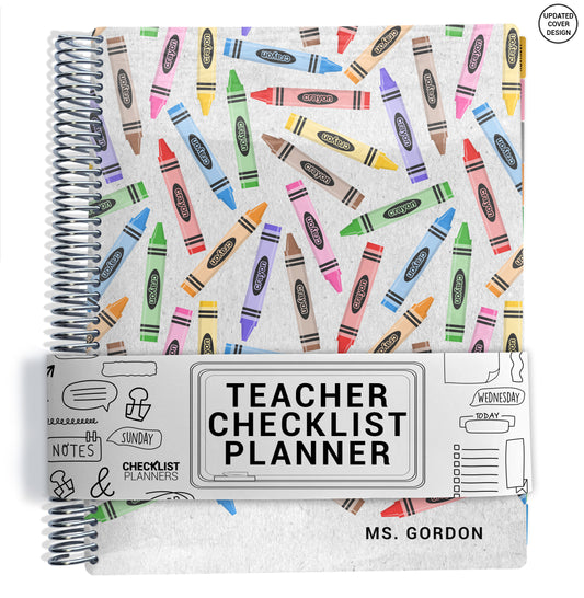 colorful crayons pattern on planner Notebook with spiral binding on a white background