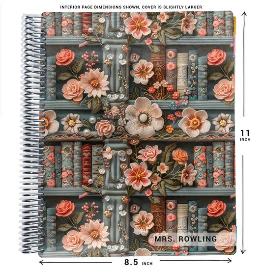pink and blue books and flowers on bookshelf pattern on planner Notebook with spiral binding and size dimensions labeled on a white background