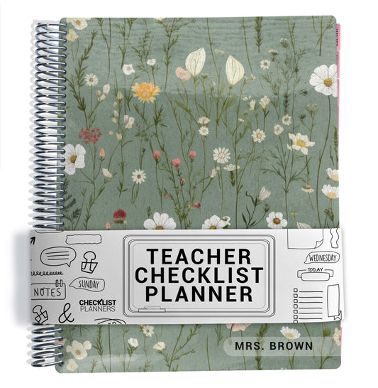 green floral pattern on planner Notebook with spiral binding on a white background