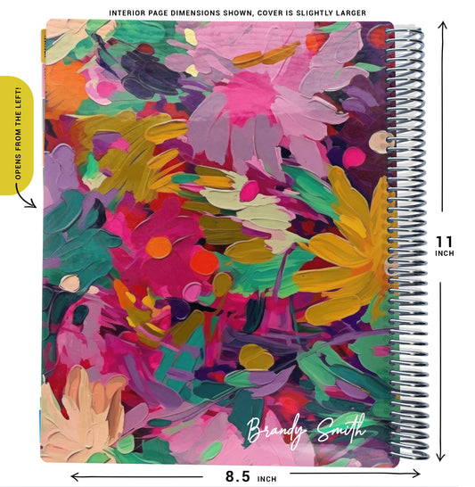 colorful pink, yellow, and purple flowers pattern on planner Notebook with spiral binding and size dimensions labeled on a white background