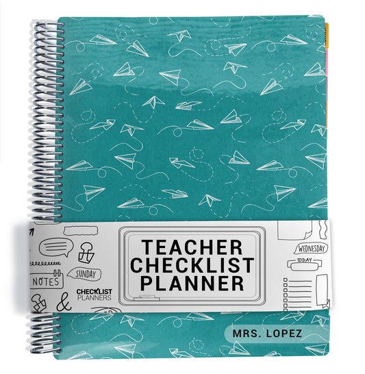 paper airplane pattern with blue background planner Notebook with spiral binding on a white background