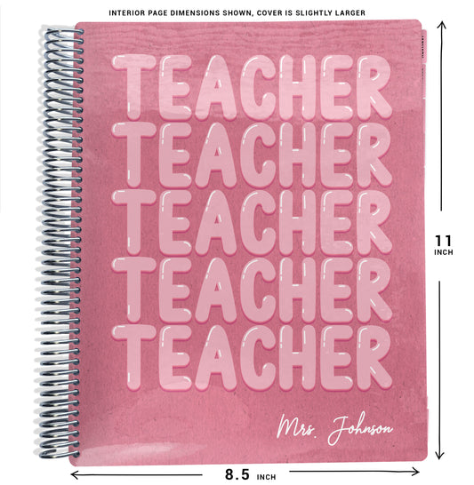 Pink planner notebook with 'Teacher' text and size dimensions on a white background