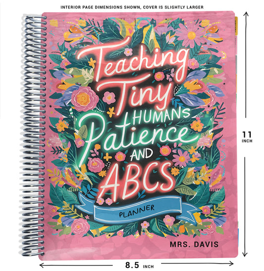 Planner with pink and green floral design and text that says 'Teaching Tiny Humans Patience and ABCs Planner' on a pink background with size dimensions shown