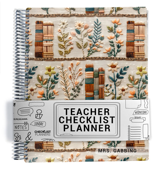 fake embroidered books and green flowers pattern on planner Notebook with spiral binding on a white background
