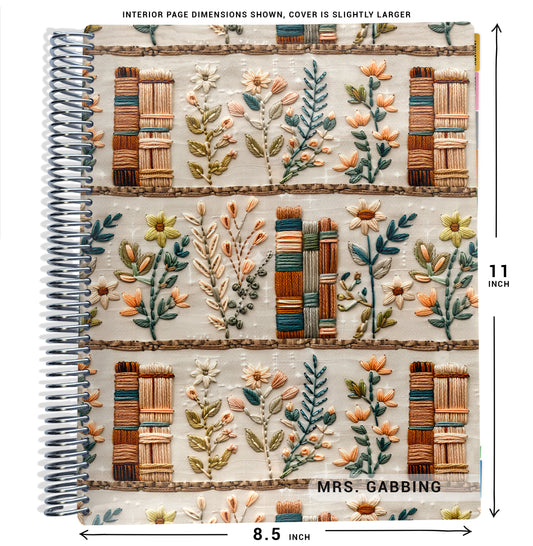 fake embroidered books and green flowers pattern on planner Notebook with spiral binding and size dimensions labeled on a white background