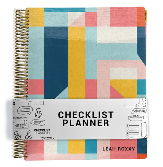 yellow, blue, pink color blocking pattern on planner Notebook with spiral binding