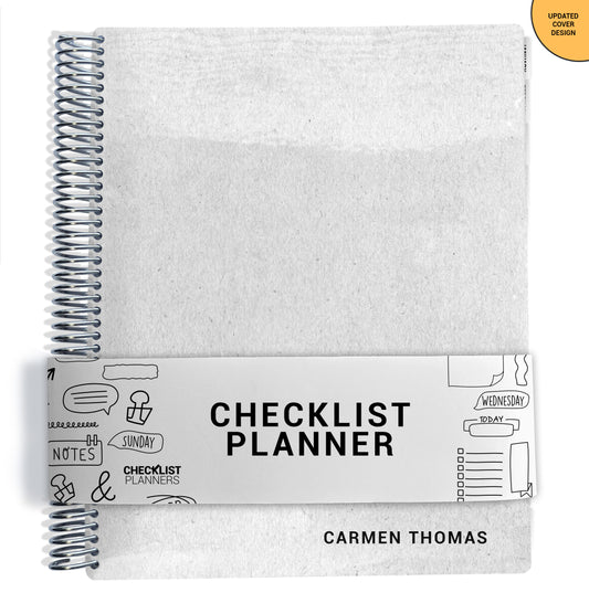 gray kraft pattern on planner Notebook with spiral binding on a white background