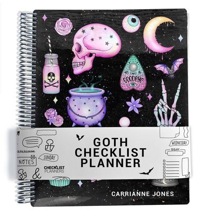 black background with pink and purple goth illustrations pattern on planner Notebook with spiral binding on a white background