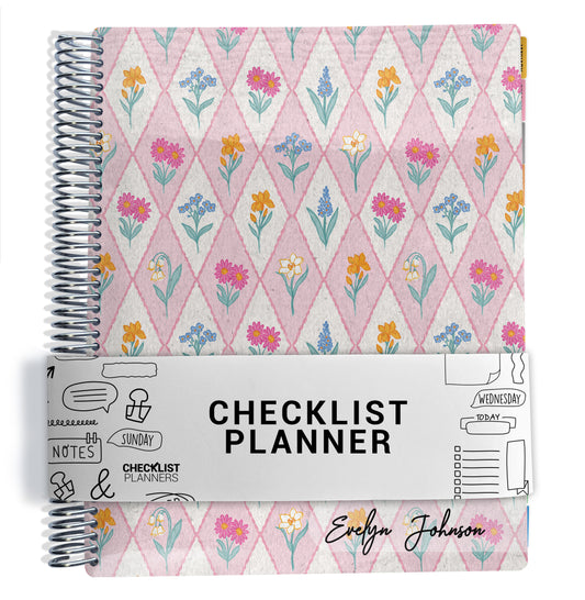 planner with pink and blue floral pattern on a white background